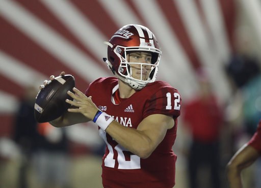 (AP Photo/Darron Cummings, File). FILE - In this Sept. 22, 2018, file photo, Indiana quarterback Peyton Ramsey (12) throws during the first half of an NCAA college football game against Michigan State, in Bloomington, Ind. Indiana’s redshirt freshman P... (AP Photo/Darron Cummings, File). FILE - In this Sept. 22, 2018, file photo, Indiana quarterback Peyton Ramsey (12) throws during the first half of an NCAA college football game against Michigan State, in Bloomington, Ind. Indiana’s redshirt freshman P...