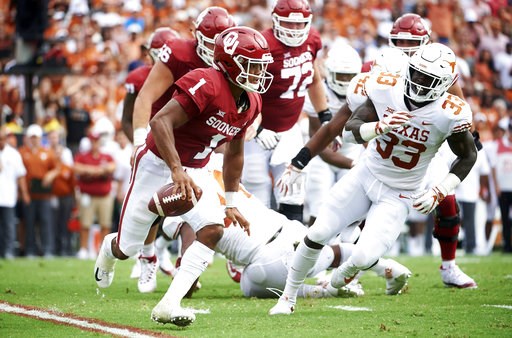 (AP Photo/Cooper Neill). Oklahoma quarterback Kyler Murray (1) scrambles against Texas during the first half of an NCAA college football game at the Cotton Bowl, Saturday, Oct. 6, 2018, in Dallas. (AP Photo/Cooper Neill). Oklahoma quarterback Kyler Murray (1) scrambles against Texas during the first half of an NCAA college football game at the Cotton Bowl, Saturday, Oct. 6, 2018, in Dallas.