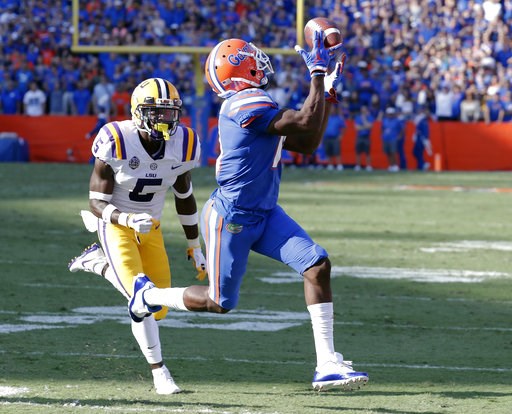 (AP Photo/John Raoux). Florida wide receiver Josh Hammond, right, catches a 35-yard pass in front of LSU cornerback Kary Vincent Jr., left, to set up a Florida touchdown in the first half of an NCAA college football game, Saturday, Oct. 6, 2018, in Gai... (AP Photo/John Raoux). Florida wide receiver Josh Hammond, right, catches a 35-yard pass in front of LSU cornerback Kary Vincent Jr., left, to set up a Florida touchdown in the first half of an NCAA college football game, Saturday, Oct. 6, 2018, in Gai...