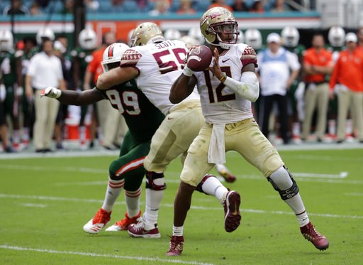 (AP Photo/Lynne Sladky). Florida State quarterback Deondre Francois (12) stands back to pass during the first half of an NCAA college football game against Miami, Saturday, Oct. 6, 2018, in Miami Gardens, Fla. (AP Photo/Lynne Sladky). Florida State quarterback Deondre Francois (12) stands back to pass during the first half of an NCAA college football game against Miami, Saturday, Oct. 6, 2018, in Miami Gardens, Fla.