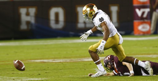 (AP Photo/Steve Helber). Notre Dame cornerback Julian Love (27) heads for the fumble as Virginia Tech quarterback Ryan Willis (5) watches during the first half of an NCAA college football game in Blacksburg, Va., Saturday, Oct. 6, 2018. Love recovered ... (AP Photo/Steve Helber). Notre Dame cornerback Julian Love (27) heads for the fumble as Virginia Tech quarterback Ryan Willis (5) watches during the first half of an NCAA college football game in Blacksburg, Va., Saturday, Oct. 6, 2018. Love recovered ...