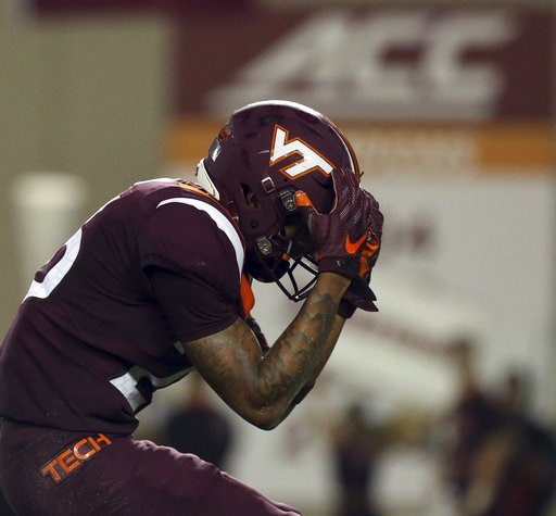 (Matt Gentry/The Roanoke Times via AP). Virginia Tech defensive back Jovonn Quillen reacts after missing an interception opportunity during the first half of an NCAA college football game against Notre Dame on Saturday, Oct. 6, 2018, in Blacksburg, Va. (Matt Gentry/The Roanoke Times via AP). Virginia Tech defensive back Jovonn Quillen reacts after missing an interception opportunity during the first half of an NCAA college football game against Notre Dame on Saturday, Oct. 6, 2018, in Blacksburg, Va.