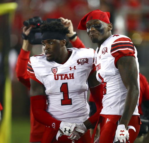 (AP Photo/Ben Margot). Utah's Tyrone Young-Smith, right, congratulates Jaylon Johnson (1) after Johnson scored a touchdown against Stanford during the first half of an NCAA college football game Saturday, Oct. 6, 2018, in Stanford, Calif. (AP Photo/Ben Margot). Utah's Tyrone Young-Smith, right, congratulates Jaylon Johnson (1) after Johnson scored a touchdown against Stanford during the first half of an NCAA college football game Saturday, Oct. 6, 2018, in Stanford, Calif.