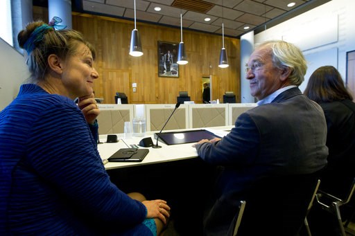 (AP Photo/Peter Dejong). Urgenda director Marjan Minnesma, left, waits for judges to enter the appeals court in The Hague, Netherlands, Tuesday, Oct. 9, 2018, where the Dutch government appealed a 2015 landmark ruling ordering the government to cut the... (AP Photo/Peter Dejong). Urgenda director Marjan Minnesma, left, waits for judges to enter the appeals court in The Hague, Netherlands, Tuesday, Oct. 9, 2018, where the Dutch government appealed a 2015 landmark ruling ordering the government to cut the...