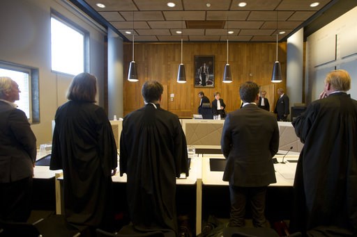 (AP Photo/Peter Dejong). Lawyers representing Urgenda, left, and the Dutch Government, right, rise as presiding judge Marie-Anne Tan-de Sonnaville, rear center right, enters the appeals court in The Hague, Netherlands, Tuesday, Oct. 9, 2018, where the ... (AP Photo/Peter Dejong). Lawyers representing Urgenda, left, and the Dutch Government, right, rise as presiding judge Marie-Anne Tan-de Sonnaville, rear center right, enters the appeals court in The Hague, Netherlands, Tuesday, Oct. 9, 2018, where the ...