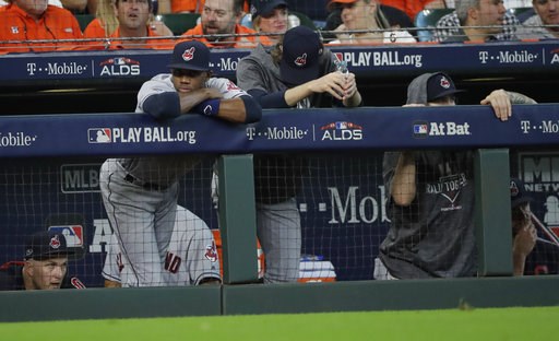 (AP Photo/David J. Phillip, File). FILE - In this Oct. 5, 2018, file photo, Cleveland Indians players watch from the dugout during the ninth inning of their 7-2 loss in Game 1 of an American League Division Series baseball game against the Houston Ast... (AP Photo/David J. Phillip, File). FILE - In this Oct. 5, 2018, file photo, Cleveland Indians players watch from the dugout during the ninth inning of their 7-2 loss in Game 1 of an American League Division Series baseball game against the Houston Ast...