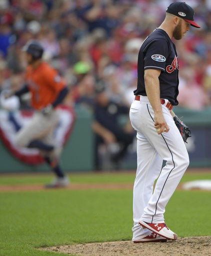 (AP Photo/David Dermer). Cleveland Indians relief pitcher Cody Allen, right, waits for Houston Astros' George Springer, back left, to run the bases after Springer hit a solo home run in the eighth inning during Game 3 of a baseball American League Divi... (AP Photo/David Dermer). Cleveland Indians relief pitcher Cody Allen, right, waits for Houston Astros' George Springer, back left, to run the bases after Springer hit a solo home run in the eighth inning during Game 3 of a baseball American League Divi...