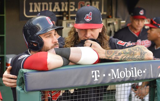 (AP Photo/Phil Long). Cleveland Indians' Jason Kipnis, left, is hugged by starting pitcher Mike Clevinger after the Houston Astros defeated the Indians 11-3 in Game 3 of a baseball American League Division Series, Monday, Oct. 8, 2018, in Cleveland. (AP Photo/Phil Long). Cleveland Indians' Jason Kipnis, left, is hugged by starting pitcher Mike Clevinger after the Houston Astros defeated the Indians 11-3 in Game 3 of a baseball American League Division Series, Monday, Oct. 8, 2018, in Cleveland.