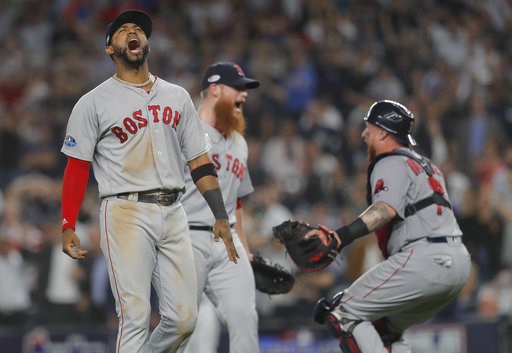 (AP Photo/Julie Jacobson). Boston Red Sox third baseman Eduardo Nunez, left, celebrates with relief pitcher Craig Kimbrel, center, and catcher Christian Vazquez after the Red Sox beat the New York Yankees 4-3 in Game 4 of baseball's American League Div... (AP Photo/Julie Jacobson). Boston Red Sox third baseman Eduardo Nunez, left, celebrates with relief pitcher Craig Kimbrel, center, and catcher Christian Vazquez after the Red Sox beat the New York Yankees 4-3 in Game 4 of baseball's American League Div...