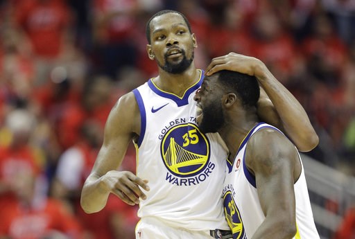 (AP Photo/David J. Phillip, File). FILE - In this May 28, 2018, file photo, Golden State Warriors forward Kevin Durant (35) celebrates with teammate Draymond Green during the second half in Game 7 of the NBA basketball Western Conference finals against... (AP Photo/David J. Phillip, File). FILE - In this May 28, 2018, file photo, Golden State Warriors forward Kevin Durant (35) celebrates with teammate Draymond Green during the second half in Game 7 of the NBA basketball Western Conference finals against...
