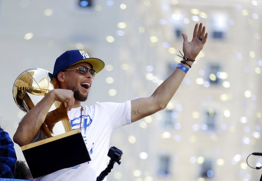(AP Photo/Marcio Jose Sanchez, file). FILE - In this June 12, 2018, file photo, Golden State Warriors' Stephen Curry carries the Larry O'Brien trophy during the team's NBA championship parade in Oakland, Calif. A fifth straight trip to the NBA Finals w... (AP Photo/Marcio Jose Sanchez, file). FILE - In this June 12, 2018, file photo, Golden State Warriors' Stephen Curry carries the Larry O'Brien trophy during the team's NBA championship parade in Oakland, Calif. A fifth straight trip to the NBA Finals w...