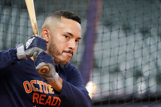 (AP Photo/David J. Phillip). Houston Astros' Carlos Correa waits to bat during a baseball workout Thursday, Oct. 4, 2018, in Houston. The Astros play the Cleveland Indians in Game 1 of the American League Division Series Friday. (AP Photo/David J. Phillip). Houston Astros' Carlos Correa waits to bat during a baseball workout Thursday, Oct. 4, 2018, in Houston. The Astros play the Cleveland Indians in Game 1 of the American League Division Series Friday.