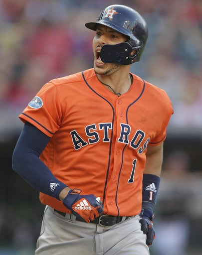 (AP Photo/David Dermer). Houston Astros' Carlos Correa looks at the dugout as he runs the bases after hitting a three-run home run in the eighth inning during Game 3 of a baseball American League Division Series against the Cleveland Indians, Monday, O... (AP Photo/David Dermer). Houston Astros' Carlos Correa looks at the dugout as he runs the bases after hitting a three-run home run in the eighth inning during Game 3 of a baseball American League Division Series against the Cleveland Indians, Monday, O...