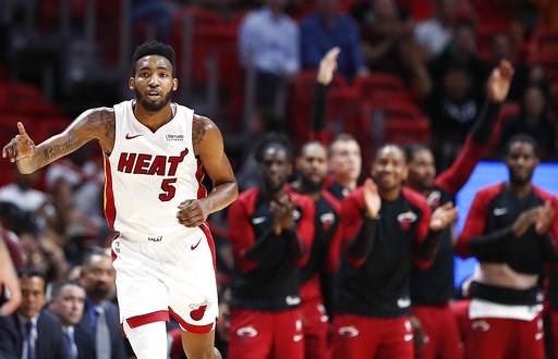 (AP Photo/Brynn Anderson). Miami Heat forward Derrick Jones Jr. and teammates, rear, celebrate after he scored against the New Orleans Pelicans during the first quarter of a preseason NBA basketball game in Miami on Wednesday, Oct. 10, 2018. (AP Photo/Brynn Anderson). Miami Heat forward Derrick Jones Jr. and teammates, rear, celebrate after he scored against the New Orleans Pelicans during the first quarter of a preseason NBA basketball game in Miami on Wednesday, Oct. 10, 2018.