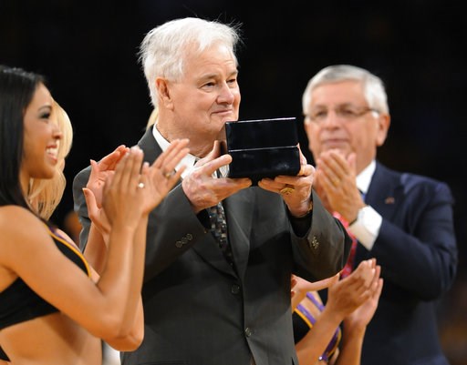 (AP Photo/Gus Ruelas, File). FILE - In this Oct. 27, 2009, file photo, Los Angeles Lakers assistant coach Tex Winter receives his NBA championship ring during the second half of the team's NBA basketball game against the Los Angeles Clippers in Los Ang... (AP Photo/Gus Ruelas, File). FILE - In this Oct. 27, 2009, file photo, Los Angeles Lakers assistant coach Tex Winter receives his NBA championship ring during the second half of the team's NBA basketball game against the Los Angeles Clippers in Los Ang...
