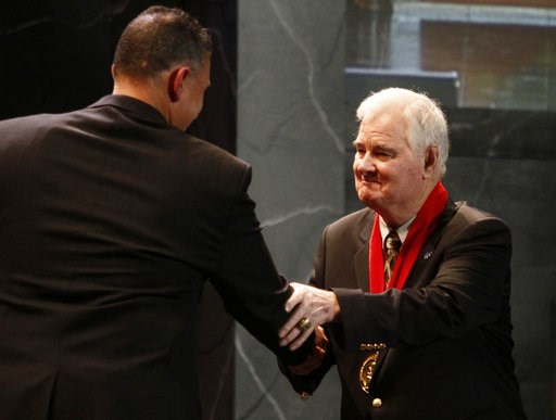 (AP Photo/Ed Zurga, File). FILE - In this Nov. 21, 2010, file photo, former Kansas State basketball coach Tex Winter, right, shakes hands with Kansas State coach Frank Martin during the former's induction into the National Collegiate Basketball Hall of... (AP Photo/Ed Zurga, File). FILE - In this Nov. 21, 2010, file photo, former Kansas State basketball coach Tex Winter, right, shakes hands with Kansas State coach Frank Martin during the former's induction into the National Collegiate Basketball Hall of...