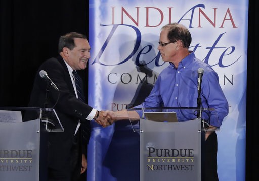 (AP Photo/Darron Cummings, Pool). In this Oct. 8, 2018 photo, Sen. Joe Donnelly, D-Ind., left, shakes hands with Republican former state Rep. Mike Braun following a U.S. Senate Debate in Westville, Ind. Libertarian Lucy Brenton also participated in the... (AP Photo/Darron Cummings, Pool). In this Oct. 8, 2018 photo, Sen. Joe Donnelly, D-Ind., left, shakes hands with Republican former state Rep. Mike Braun following a U.S. Senate Debate in Westville, Ind. Libertarian Lucy Brenton also participated in the...