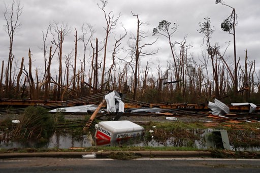 (AP Photo/Gerald Herbert). Shredded trees, derailed train cars and a sunken trailer are seen in the aftermath of Hurricane Michael in Panama City, Fla., Wednesday, Oct. 10, 2018. (AP Photo/Gerald Herbert). Shredded trees, derailed train cars and a sunken trailer are seen in the aftermath of Hurricane Michael in Panama City, Fla., Wednesday, Oct. 10, 2018.