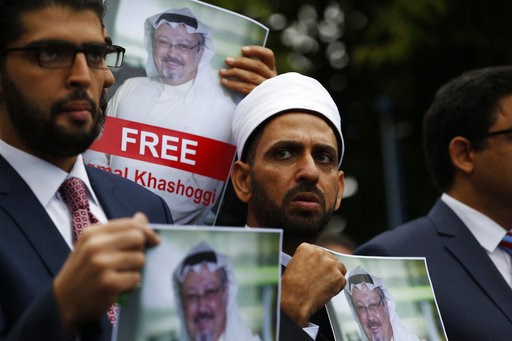 (AP Photo/Lefteris Pitarakis, File). FILE - In this Monday, Oct. 8, 2018 file photo, members of the Turkish-Arab Journalist Association hold posters with photos of missing Saudi writer Jamal Khashoggi, as they hold a protest near the Saudi Arabia consu... (AP Photo/Lefteris Pitarakis, File). FILE - In this Monday, Oct. 8, 2018 file photo, members of the Turkish-Arab Journalist Association hold posters with photos of missing Saudi writer Jamal Khashoggi, as they hold a protest near the Saudi Arabia consu...