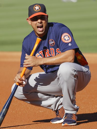 (AP Photo/David J. Phillip, file). FILE - In this Oct. 25, 2017 file photo, Houston Astros bench coach Alex Cora watches batting practice before Game 2 of baseball's World Series against the Los Angeles Dodgers in Los Angeles. Current Boston Red Sox ma... (AP Photo/David J. Phillip, file). FILE - In this Oct. 25, 2017 file photo, Houston Astros bench coach Alex Cora watches batting practice before Game 2 of baseball's World Series against the Los Angeles Dodgers in Los Angeles. Current Boston Red Sox ma...