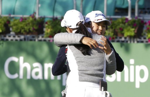 (AP Photo/Ahn Young-joon). Nasa Hataoka, right, of Japan hugs Minjee Lee of Australia after finishing the first round of the LPGA KEB Hana Bank Championship at Sky72 Golf Club in Incheon, South Korea, Thursday, Oct. 11, 2018. (AP Photo/Ahn Young-joon). Nasa Hataoka, right, of Japan hugs Minjee Lee of Australia after finishing the first round of the LPGA KEB Hana Bank Championship at Sky72 Golf Club in Incheon, South Korea, Thursday, Oct. 11, 2018.