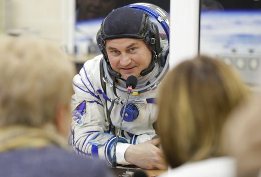 (AP Photo/Dmitri Lovetsky). Russian cosmonaut Alexey Ovchinin, a member of the main crew of the expedition to the International Space Station (ISS), speaks with his relatives through a safety glass prior to the launch of Soyuz MS-10 space ship at the R... (AP Photo/Dmitri Lovetsky). Russian cosmonaut Alexey Ovchinin, a member of the main crew of the expedition to the International Space Station (ISS), speaks with his relatives through a safety glass prior to the launch of Soyuz MS-10 space ship at the R...