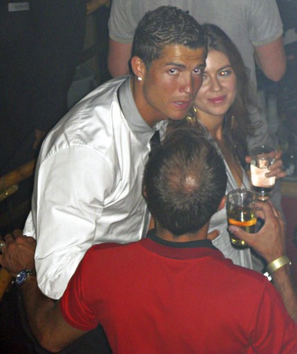 (Matrixpictures via AP). In this June 2009 photo made available to the Associated Press on Friday Oct. 5, 2018, soccer star Cristiano Ronaldo is pictured with Kathryn Mayorga in Rain Nightclub in Las Vegas. A lawyer for Mayorga, who is alleging that Ro... (Matrixpictures via AP). In this June 2009 photo made available to the Associated Press on Friday Oct. 5, 2018, soccer star Cristiano Ronaldo is pictured with Kathryn Mayorga in Rain Nightclub in Las Vegas. A lawyer for Mayorga, who is alleging that Ro...