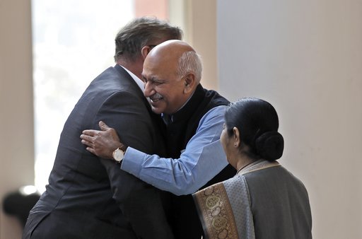 (AP Photo/Manish Swarup, File). FILE - In this Nov. 24, 2017 file photo, Indian Junior Foreign Minister M.J. Akbar, center, hugs Finland's Foreign Minister Timo Soini in New Delhi, India. A complaint by a retired Bollywood actress living in the United ... (AP Photo/Manish Swarup, File). FILE - In this Nov. 24, 2017 file photo, Indian Junior Foreign Minister M.J. Akbar, center, hugs Finland's Foreign Minister Timo Soini in New Delhi, India. A complaint by a retired Bollywood actress living in the United ...