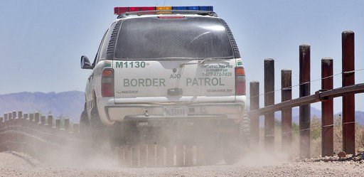 (AP Photo/Matt York). FILE - In this May 26, 2006 file photo, a U.S. Border Patrol agent patrols the international border separating Sonoyta, Mexico, right of fence, and Lukeville, Ariz., in Organ Pipe Cactus National Monument. Smugglers in recent week... (AP Photo/Matt York). FILE - In this May 26, 2006 file photo, a U.S. Border Patrol agent patrols the international border separating Sonoyta, Mexico, right of fence, and Lukeville, Ariz., in Organ Pipe Cactus National Monument. Smugglers in recent week...
