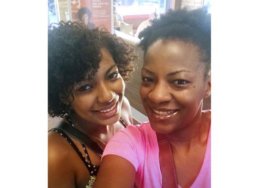 (Nerdwallet via AP). In this August 2015 photo provided by Nerdwallet, Taje Perkins, left, poses for a photo with her mother Takiia Anderson on her first day at Spelman College in Atlanta. Today, Anderson’s student debt is long gone. She has nearly $50... (Nerdwallet via AP). In this August 2015 photo provided by Nerdwallet, Taje Perkins, left, poses for a photo with her mother Takiia Anderson on her first day at Spelman College in Atlanta. Today, Anderson’s student debt is long gone. She has nearly $50...