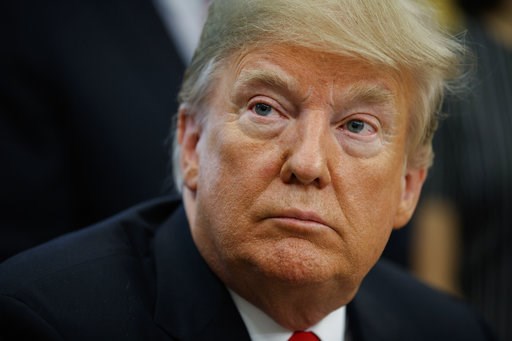 (AP Photo/Evan Vucci). President Donald Trump listens to a question during a signing ceremony for the "Save Our Seas Act of 2018" in the Oval Office of the White House, Thursday, Oct. 11, 2018, in Washington. (AP Photo/Evan Vucci). President Donald Trump listens to a question during a signing ceremony for the "Save Our Seas Act of 2018" in the Oval Office of the White House, Thursday, Oct. 11, 2018, in Washington.
