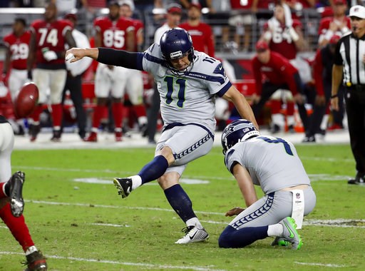 (AP Photo/Rick Scuteri, File). FILE - In this Sunday, Sept. 30, 2018, file photo, Seattle Seahawks kicker Sebastian Janikowski (11) kicks the game-winning field goal as punter Michael Dickson (4) holds during the second half of an NFL football game aga... (AP Photo/Rick Scuteri, File). FILE - In this Sunday, Sept. 30, 2018, file photo, Seattle Seahawks kicker Sebastian Janikowski (11) kicks the game-winning field goal as punter Michael Dickson (4) holds during the second half of an NFL football game aga...