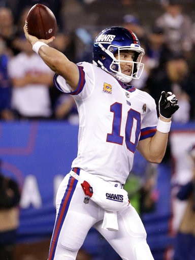 (AP Photo/Julio Cortez). New York Giants quarterback Eli Manning throws a pass during the first half of the team's NFL football game against the Philadelphia Eagles on Thursday, Oct. 11, 2018, in East Rutherford, N.J. (AP Photo/Julio Cortez). New York Giants quarterback Eli Manning throws a pass during the first half of the team's NFL football game against the Philadelphia Eagles on Thursday, Oct. 11, 2018, in East Rutherford, N.J.