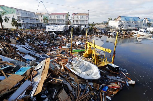 (AP Photo/Gerald Herbert). A boat sits amidst debris in the aftermath of Hurricane Michael in Mexico Beach, Fla., Thursday, Oct. 11, 2018. (AP Photo/Gerald Herbert). A boat sits amidst debris in the aftermath of Hurricane Michael in Mexico Beach, Fla., Thursday, Oct. 11, 2018.