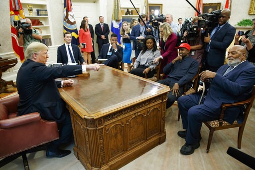 (AP Photo/Evan Vucci). President Donald Trump meets with rapper Kanye West and former football player Jim Brown in the Oval Office of the White House, Thursday, Oct. 11, 2018, in Washington. (AP Photo/Evan Vucci). President Donald Trump meets with rapper Kanye West and former football player Jim Brown in the Oval Office of the White House, Thursday, Oct. 11, 2018, in Washington.