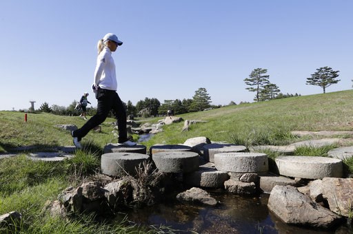 (AP Photo/Lee Jin-man). Danielle Kang of the United States walks on the second hole during the second round of the LPGA KEB Hana Bank Championship at Sky72 Golf Club in Incheon, South Korea, Friday, Oct. 12, 2018. (AP Photo/Lee Jin-man). Danielle Kang of the United States walks on the second hole during the second round of the LPGA KEB Hana Bank Championship at Sky72 Golf Club in Incheon, South Korea, Friday, Oct. 12, 2018.