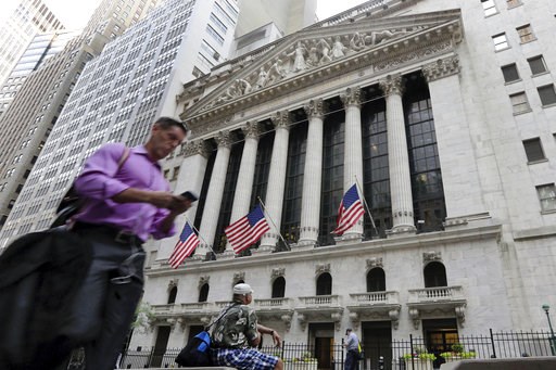 (AP Photo/Richard Drew, File). FILE - In this June 24, 2016, file photo, a man walks by the New York Stock Exchange. The U.S. stock market opens at 9:30 a.m. EDT on Friday, Oct. 12, 2018. (AP Photo/Richard Drew, File). FILE - In this June 24, 2016, file photo, a man walks by the New York Stock Exchange. The U.S. stock market opens at 9:30 a.m. EDT on Friday, Oct. 12, 2018.
