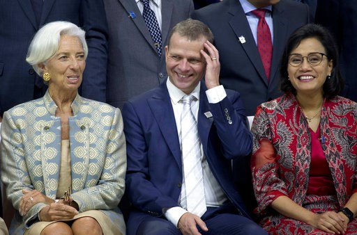 (AP Photo/Firdia Lisnawati). From left to right, Managing Director of International Monetary Fund (IMF) Christine Lagarde, Finland's Finance Minister Petteri Orpo, and Indonesia's Finance Minister Sri Mulyani Indrawati pose for a group photo during the... (AP Photo/Firdia Lisnawati). From left to right, Managing Director of International Monetary Fund (IMF) Christine Lagarde, Finland's Finance Minister Petteri Orpo, and Indonesia's Finance Minister Sri Mulyani Indrawati pose for a group photo during the...