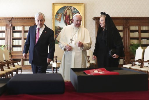 (Alessandro Bianchi/Pool Photo via AP). Pope Francis speaks as he meets with Chile's President Sebastian Pinera and his wife Cecilia Morel during a private audience at the Vatican, Saturday, Oct. 13, 2018. (Alessandro Bianchi/Pool Photo via AP). Pope Francis speaks as he meets with Chile's President Sebastian Pinera and his wife Cecilia Morel during a private audience at the Vatican, Saturday, Oct. 13, 2018.
