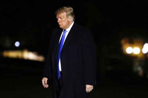 Trump says climate change not a hoax, not sure of its source