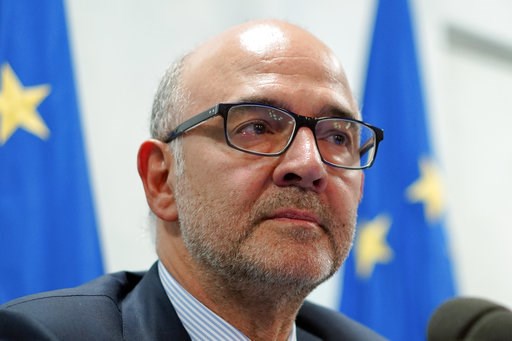 EU budget chief seeks to ease tensions with Italy