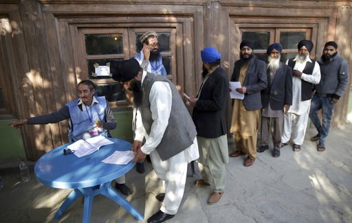 The Latest: Suicide blast kills 3 at Afghan polling station