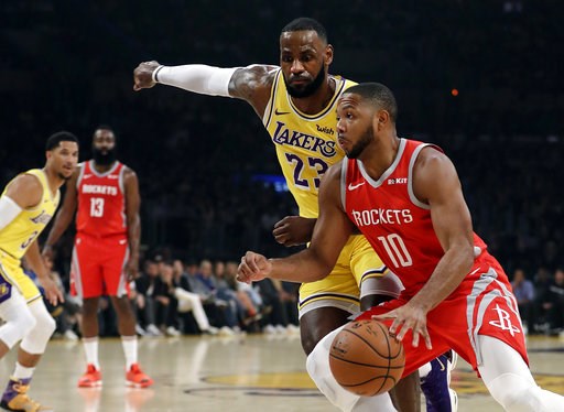 Fight in LeBron's home Lakers debut, 124-115 loss to Houston