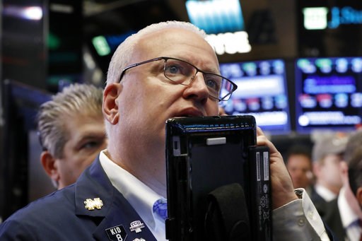 Stocks mostly recover from an early plunge on Wall Street