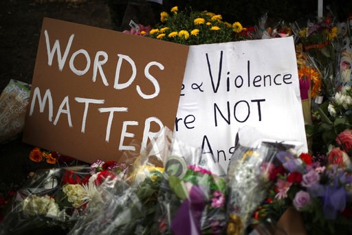 (AP Photo/Gene J. Puskar). Flowers surround signs on Wednesday, Oct. 31, 2018, part of a makeshift memorial outside the Tree of Life Synagogue to the 11 people killed during worship services Saturday Oct. 27, 2018 in Pittsburgh. (AP Photo/Gene J. Puskar). Flowers surround signs on Wednesday, Oct. 31, 2018, part of a makeshift memorial outside the Tree of Life Synagogue to the 11 people killed during worship services Saturday Oct. 27, 2018 in Pittsburgh.
