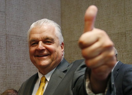 (AP Photo/John Locher). FILE - In this June 12, 2018, file photo, Clark County Commission Chair and Democratic gubernatorial candidate Steve Sisolak gives a thumbs-up on primary election night in Las Vegas. Sisolak is running against Republican Adam La... (AP Photo/John Locher). FILE - In this June 12, 2018, file photo, Clark County Commission Chair and Democratic gubernatorial candidate Steve Sisolak gives a thumbs-up on primary election night in Las Vegas. Sisolak is running against Republican Adam La...