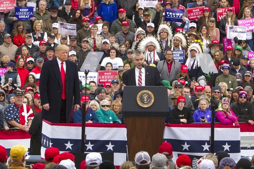 (AP Photo/Janie Osborne). Senate candidate Matt Rosendale speaks as President Donald Trump listens at a rally in Belgrade, Mont., Saturday, Nov. 3, 2018. (AP Photo/Janie Osborne). Senate candidate Matt Rosendale speaks as President Donald Trump listens at a rally in Belgrade, Mont., Saturday, Nov. 3, 2018.