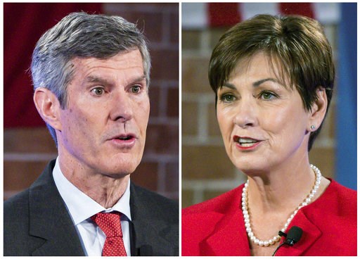 (Rodney White/Des Moines Register via AP, Pool, File). FILE - This combination of Oct. 10, 2018, file photos show Iowa Democratic gubernatorial candidate Fred Hubbell, left, and Iowa Republican Gov. Kim Reynolds during a debate in Des Moines. (Rodney White/Des Moines Register via AP, Pool, File). FILE - This combination of Oct. 10, 2018, file photos show Iowa Democratic gubernatorial candidate Fred Hubbell, left, and Iowa Republican Gov. Kim Reynolds during a debate in Des Moines.