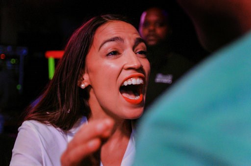 (AP Photo/Stephen Groves). New York Democratic Congressional candidate Alexandria Ocasio-Cortez speaks to supporters, Tuesday, Nov. 6, 2018 in Queens the Queens borough of New York, after defeating Republican challenger Anthony Pappas in the race for t... (AP Photo/Stephen Groves). New York Democratic Congressional candidate Alexandria Ocasio-Cortez speaks to supporters, Tuesday, Nov. 6, 2018 in Queens the Queens borough of New York, after defeating Republican challenger Anthony Pappas in the race for t...