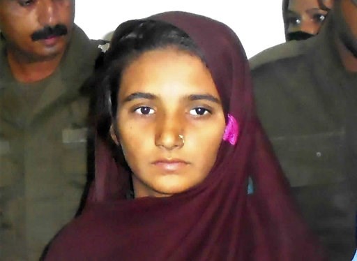 (AP Photo/Iram Asim, File). FILE - In this Monday, Oct. 30, 2017, file photo, Aasia Bibi is presented to journalists at a police station in Muzaffargarh, Pakistan. Bibi was acquitted in Pakistan, Thursday, Nov. 8, 2018, after eight years on death row f... (AP Photo/Iram Asim, File). FILE - In this Monday, Oct. 30, 2017, file photo, Aasia Bibi is presented to journalists at a police station in Muzaffargarh, Pakistan. Bibi was acquitted in Pakistan, Thursday, Nov. 8, 2018, after eight years on death row f...